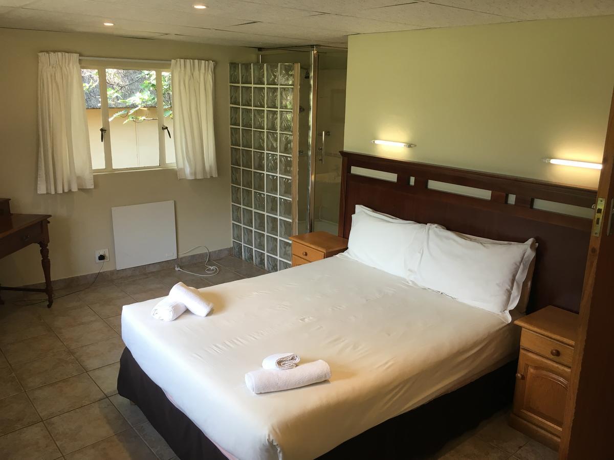 Dragon Peaks Mountain Resort Champagne Valley Exterior foto